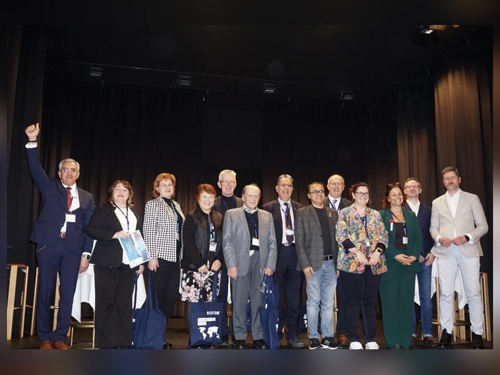 Prof. Georgi Chaltikyan is joining speakers and organisers for the closing photograph