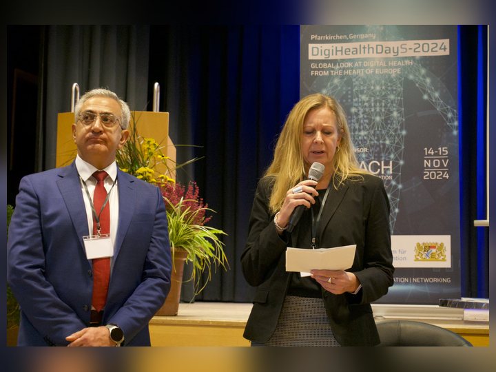 Prof. Georgi Chaltikyan co-hosting a main-stage session