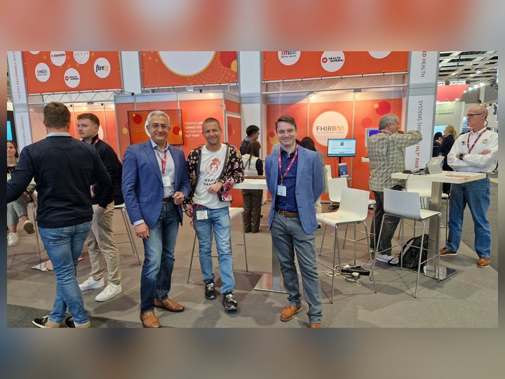 Prof. Georgi Chaltikyan speaking with exhibitors at DMEA 2025