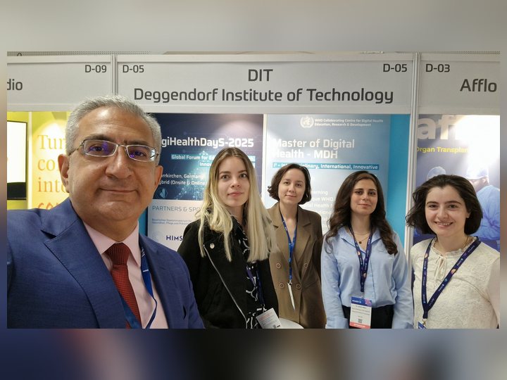 Prof. Georgi Chaltikyan with colleagues at the HIMSS Europe exhibition