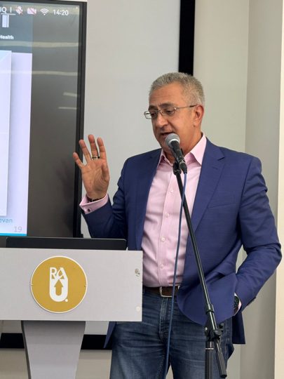Prof. Georgi Chaltikyan delivering a keynote at the ArmDigiHealth-2025 inaugural conference