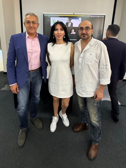 Prof. Georgi Chaltikyan with two guests at ArmDigiHealth-2025