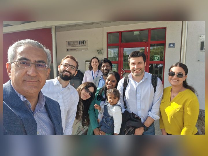 Prof. Georgi Chaltikyan taking a group selfie with visiting participants during Interoperability Week 2026