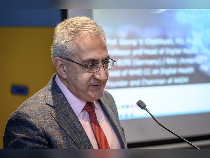 Prof. Georgi Chaltikyan speaking during the digital health presentation