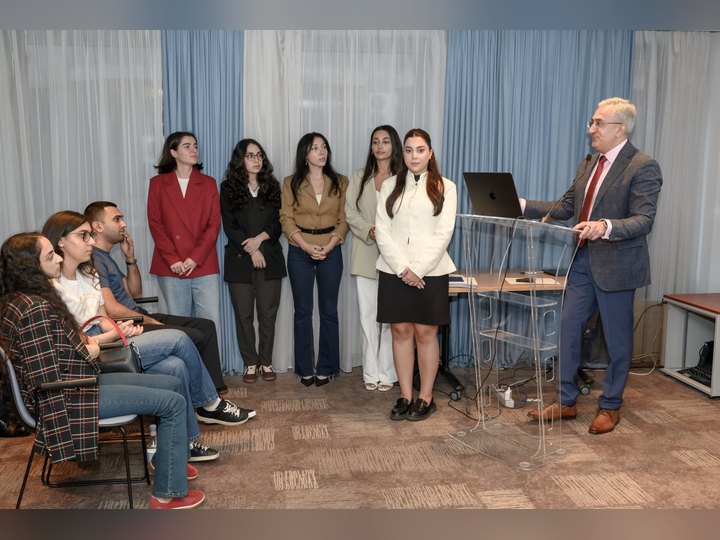 Prof. Georgi Chaltikyan recognising graduates during the closing programme