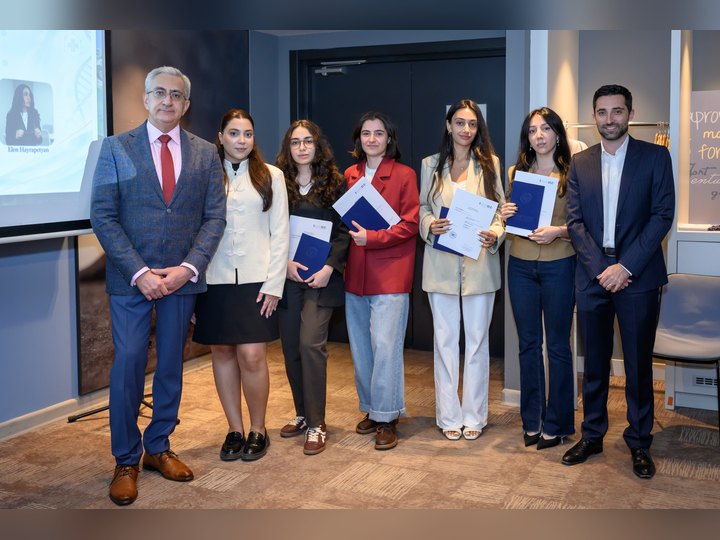 Prof. Georgi Chaltikyan with graduates receiving their certificates