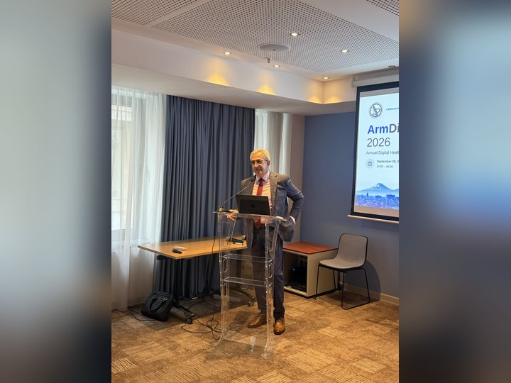 Prof. Georgi Chaltikyan at the lectern during the conference programme